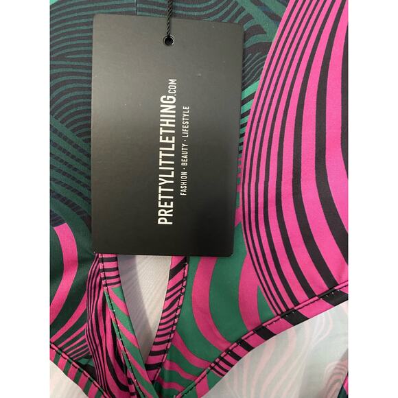 NWT Pretty little things pink print slinky cross front bodysuit size 0 - Picture 8 of 9